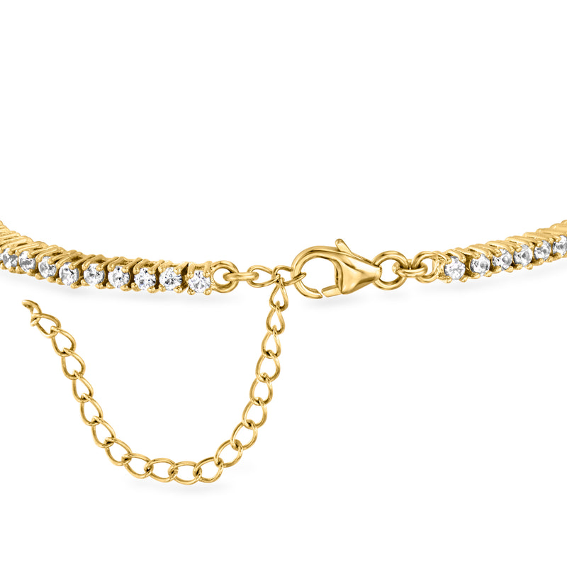 Gold-over-sterling tennis bracelet with white stones, lobster clasp, and extender chain