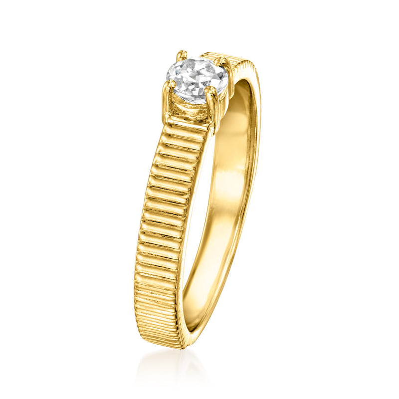 Gold over sterling ring with white topaz set in ridged band, side view