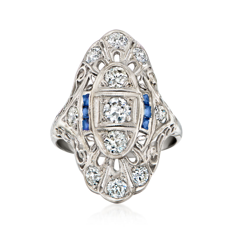 Vintage platinum dinner ring with diamond cluster and blue synthetic sapphire accents