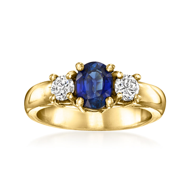 14kt yellow gold sapphire and diamond three-stone oval ring
