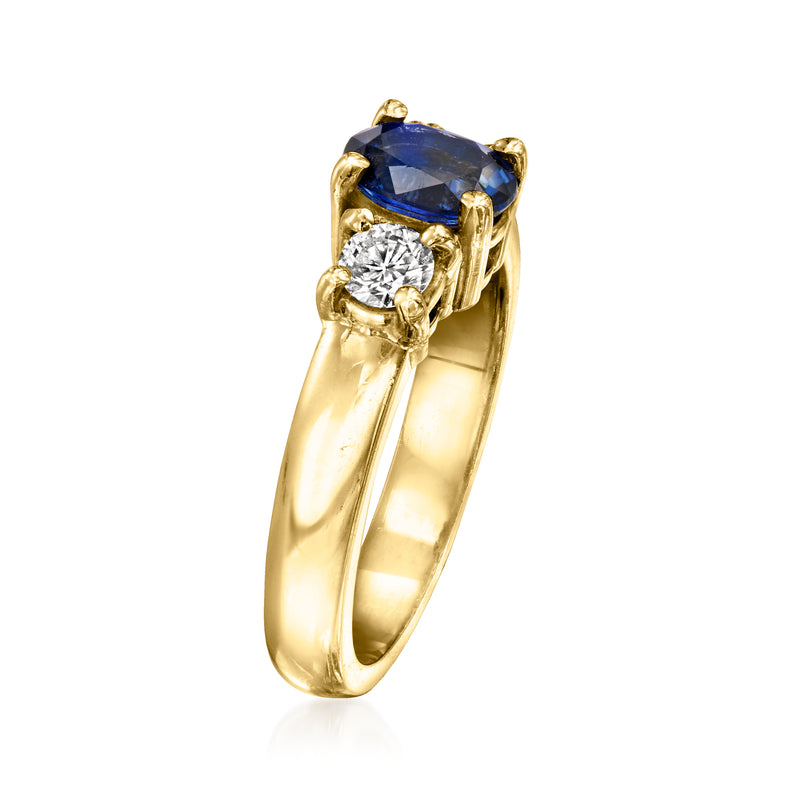 14kt yellow gold oval sapphire ring with two diamond side stones