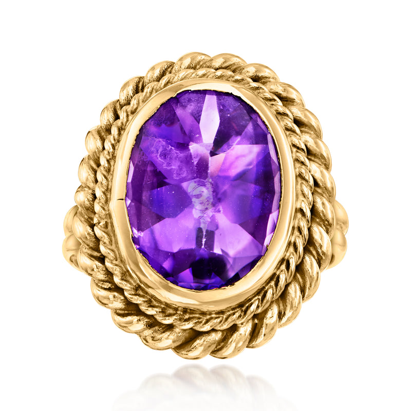 Vintage oval amethyst ring in 14kt yellow gold with braided halo setting