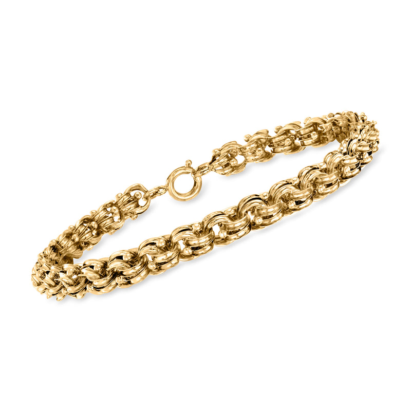 Vintage 14kt yellow gold fancy-link bracelet with round ring clasp and textured chain links