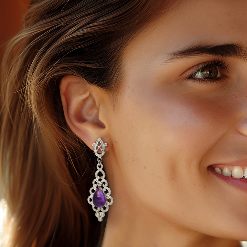 Side view amethyst teardrop drop earrings with diamond cluster accents in white gold