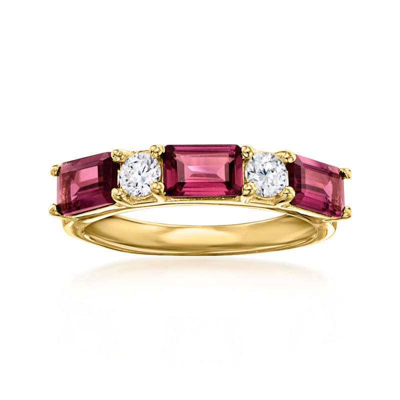 Gold-toned ring with rectangular rhodolite-style center, pink side stones, round diamond accents