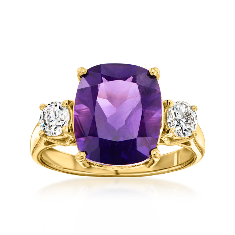 Gold amethyst ring with oval purple center stone and two round diamond side accents