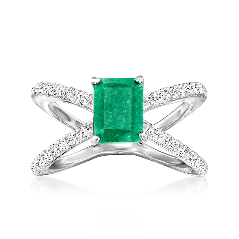 Sterling silver crisscross ring with emerald-cut green gemstone and clear white stones