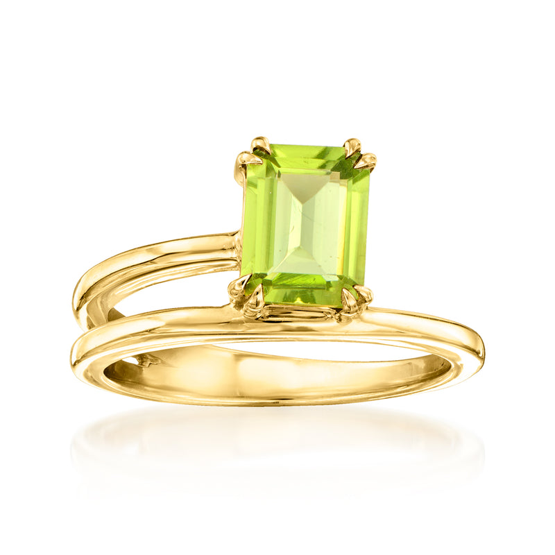 Gold wrap ring with square-cut green peridot gemstone and four corner prongs