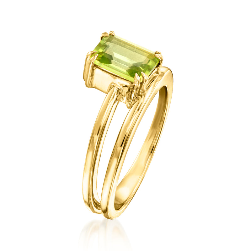 Gold wrap ring with rectangular green peridot gemstone in raised prong setting