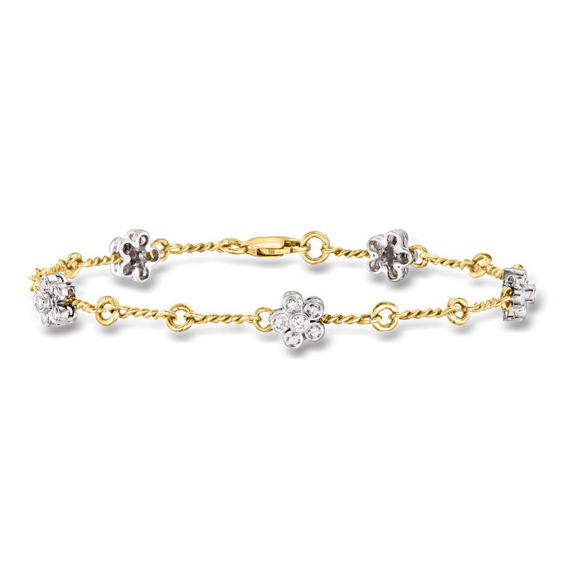 Two-tone gold diamond flower station bracelet with round-cut flower accents