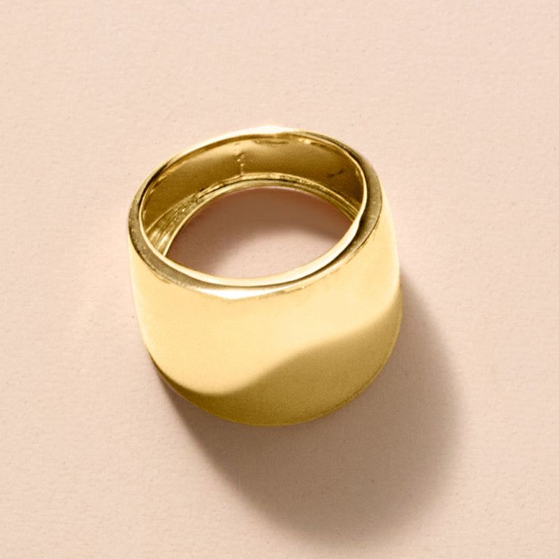 Polished 10kt yellow gold dome ring, inner band visible
