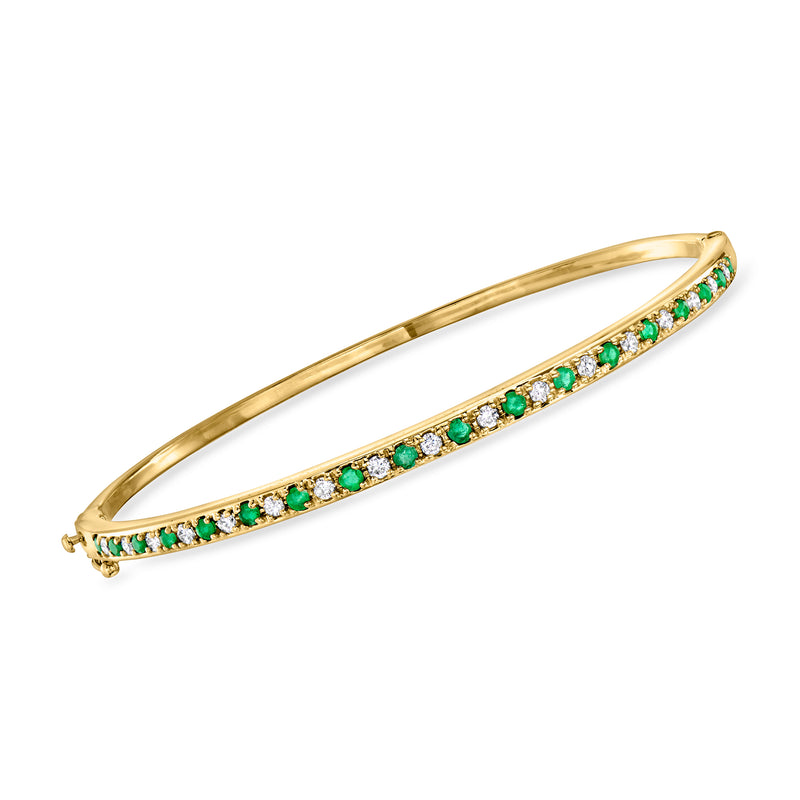 14kt yellow gold bangle bracelet with green emerald and white diamond row