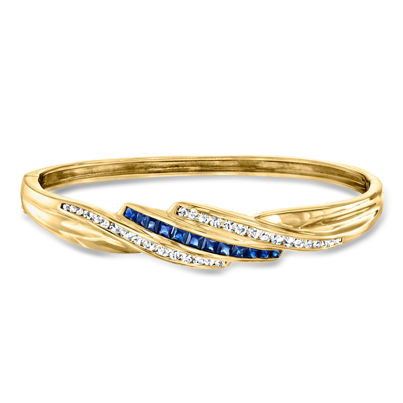 18k yellow gold bangle bracelet with blue sapphire insets and diamond accents