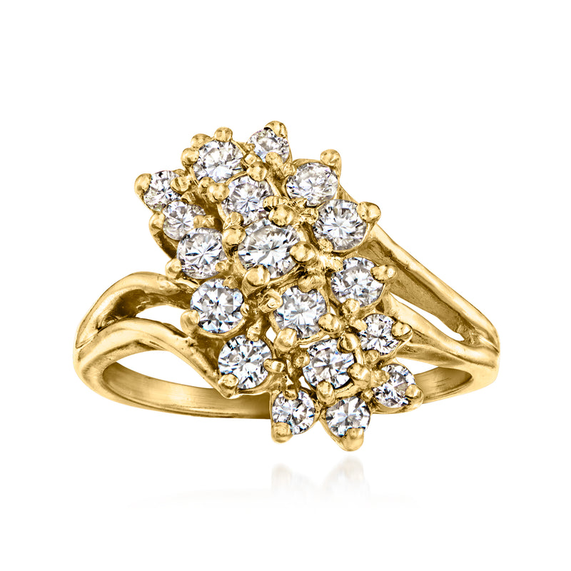 Yellow gold diamond cluster ring with multiple round-cut stones in a floral setting