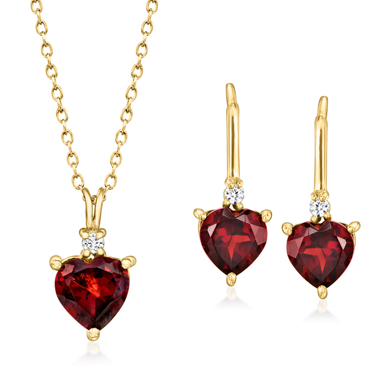 Gold jewelry set: heart pendant necklace and drop earrings with red garnet hearts