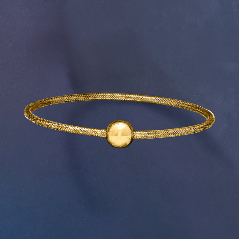 Gold bead mesh stretch bracelet with round gold bead centerpiece charm, side view