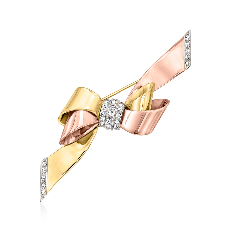 Tri-colored gold bow pin with diamond accents and hinged safety clasp