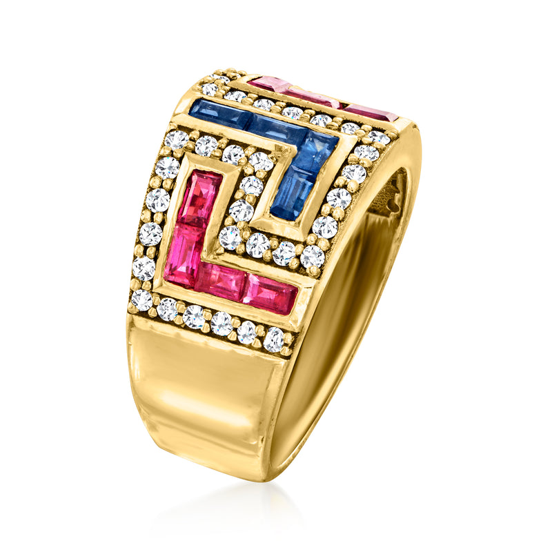 Side view of yellow gold ring with pink, blue, and white diamond-like stones