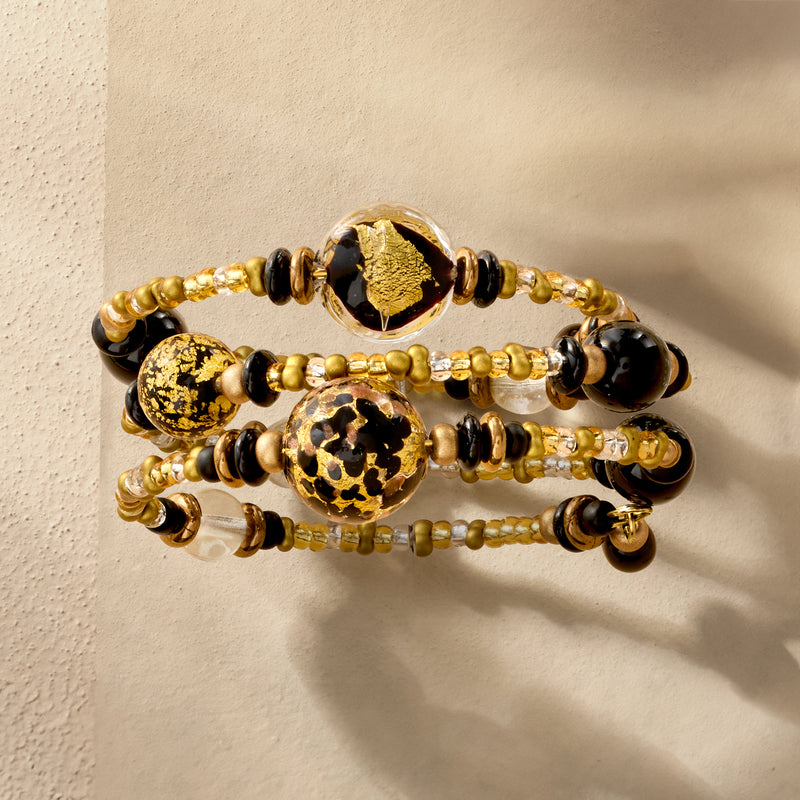 Wrap bracelet with black glass beads and gold flecked round Murano charms, clasp detail