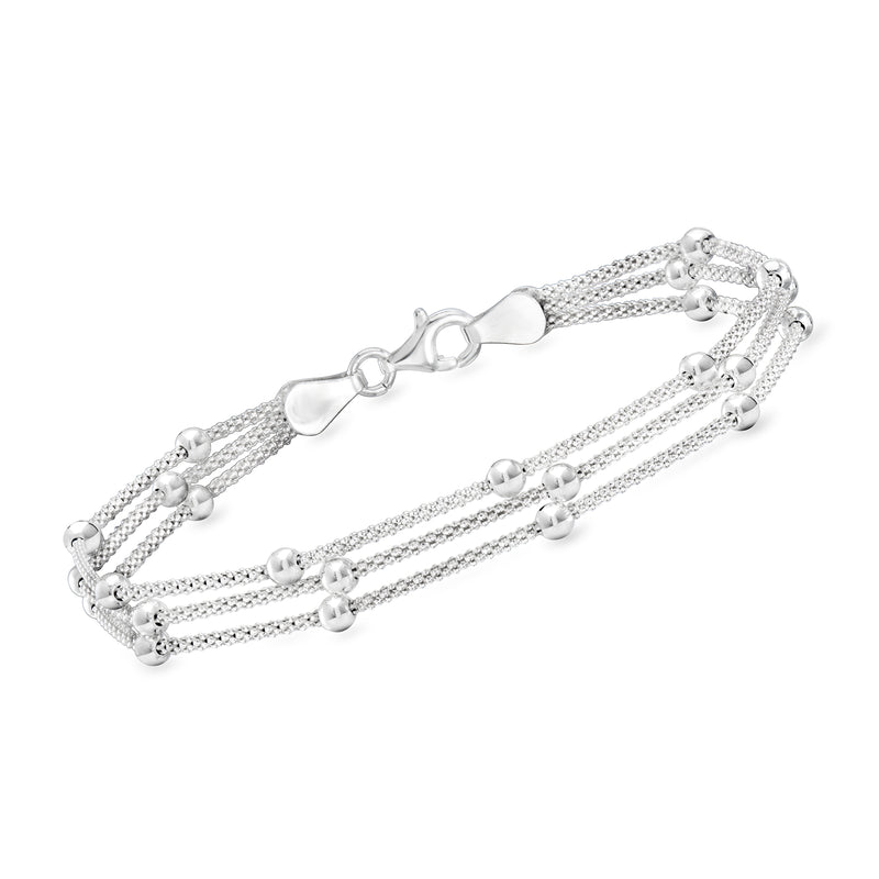 Sterling silver three-strand bead station bracelet with lobster clasp and round beads