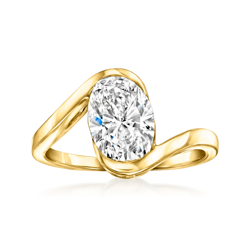 Asymmetrical yellow gold ring with oval diamond center and curved open band