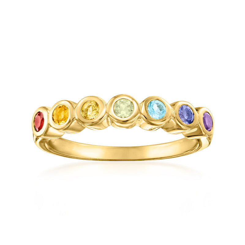 Gold-tone bezel-set multi-gemstone ring with red, yellow, green, blue, and purple stones