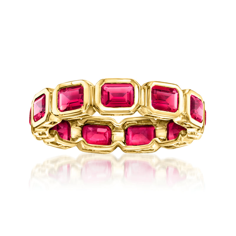 Gold eternity band with pink ruby stones in square settings