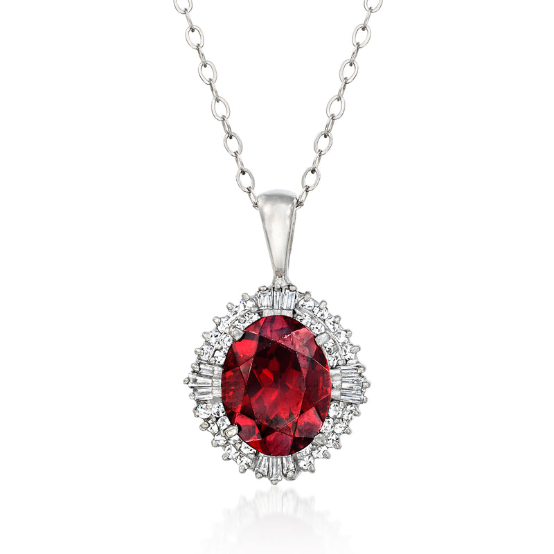 Vintage garnet pendant necklace with red oval garnet and diamond halo, platinum chain