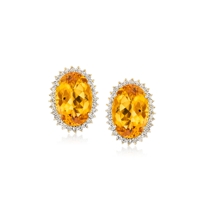 Oval citrine gemstone stud earrings in yellow gold with diamond halo trim