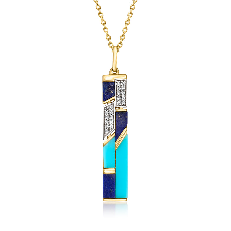 Gold-tone pendant necklace with turquoise and lapis rectangle bar, clear stone accents.