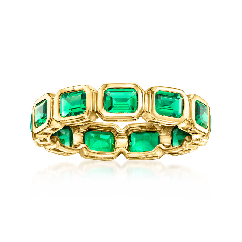 18kt gold over sterling eternity band with emerald-cut green stones
