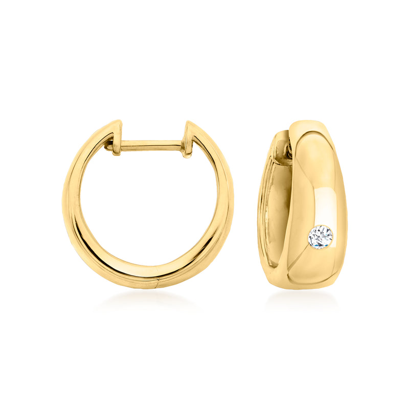 Gold huggie hoop earrings with small round diamond accents