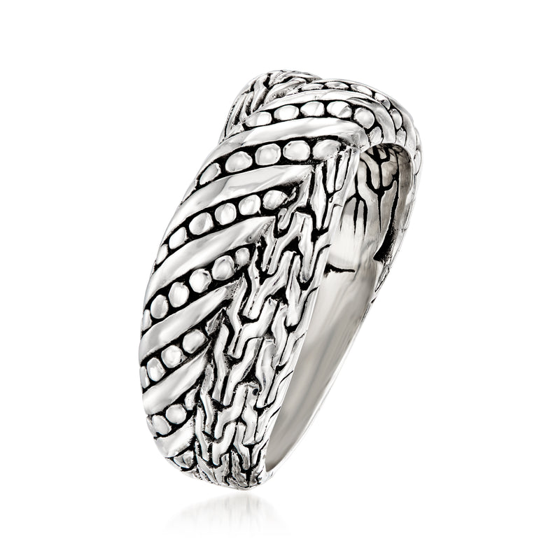 Sterling silver crisscross ring, side view with raised woven texture and dot accents