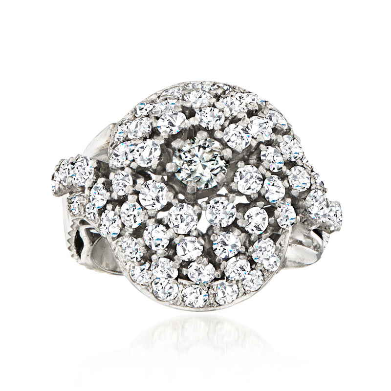 Platinum dome cluster ring with round diamonds and scalloped halo setting
