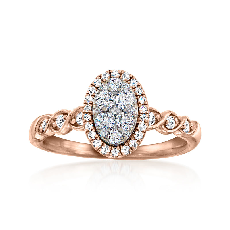 Vintage oval diamond cluster ring in 10kt rose gold with round diamond halo