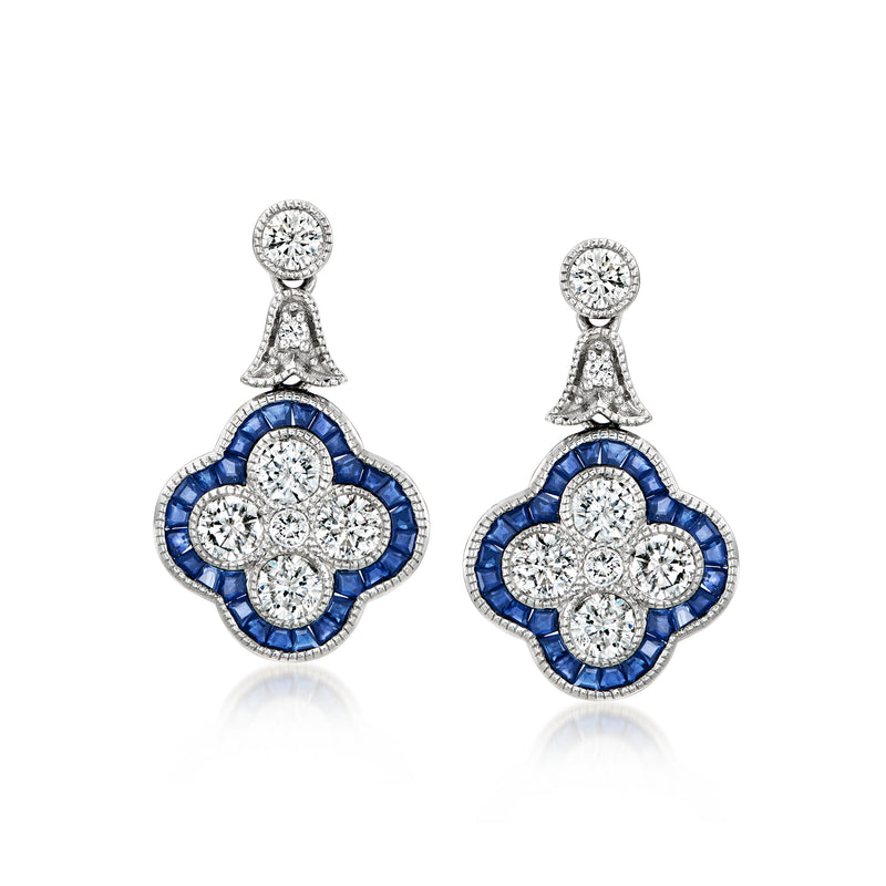 Platinum clover drop earrings with blue stones and round diamond-like accents