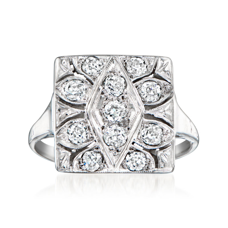 Vintage white gold cocktail ring with oval and round diamond clusters, geometric top