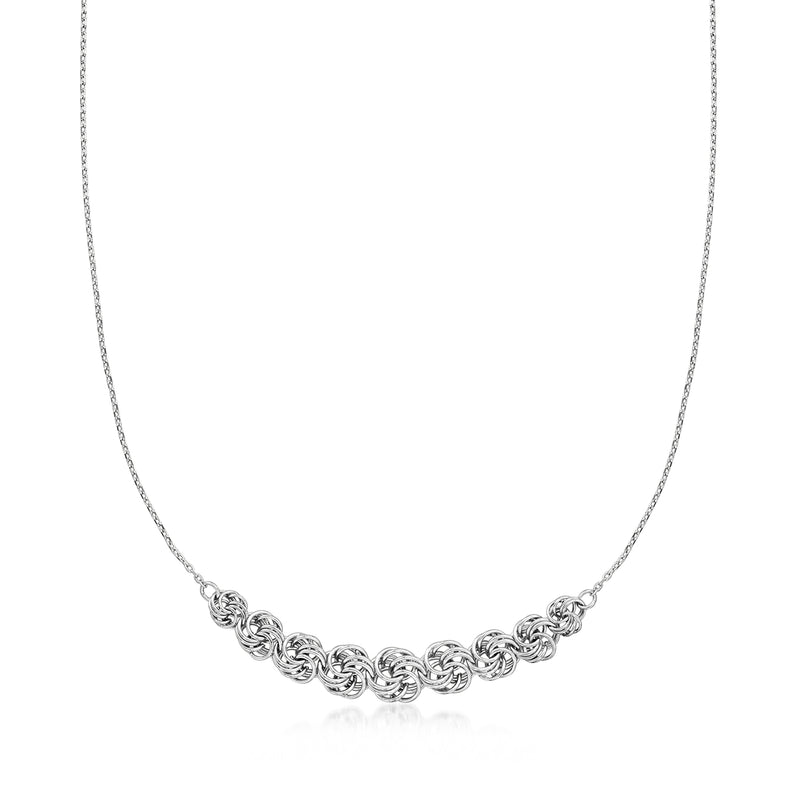 Sterling silver rosette-link station necklace with curved chain station links