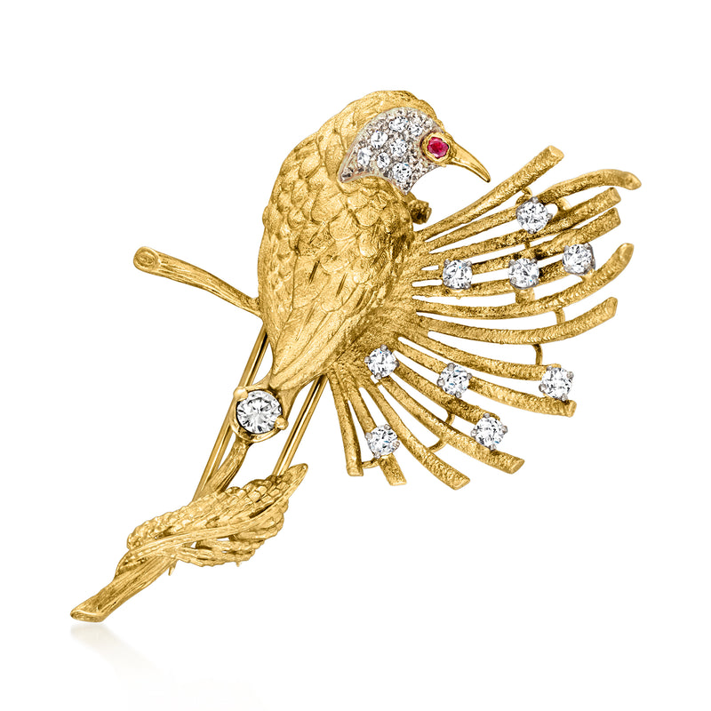 18kt yellow gold diamond and ruby bird pin with flying-wing design