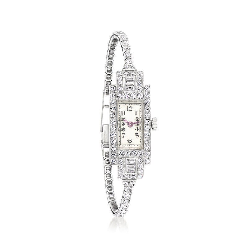Platinum diamond vintage wristwatch with rectangular dial, jeweled bezel and link bracelet