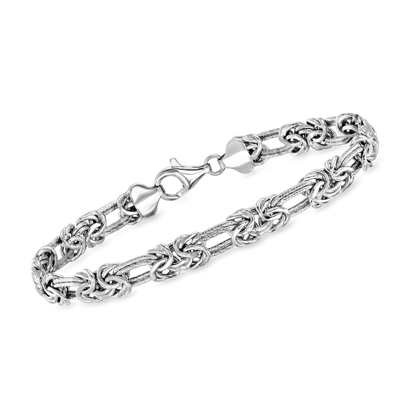 Sterling silver link bracelet with Byzantine and double-oval pattern, toggle clasp.