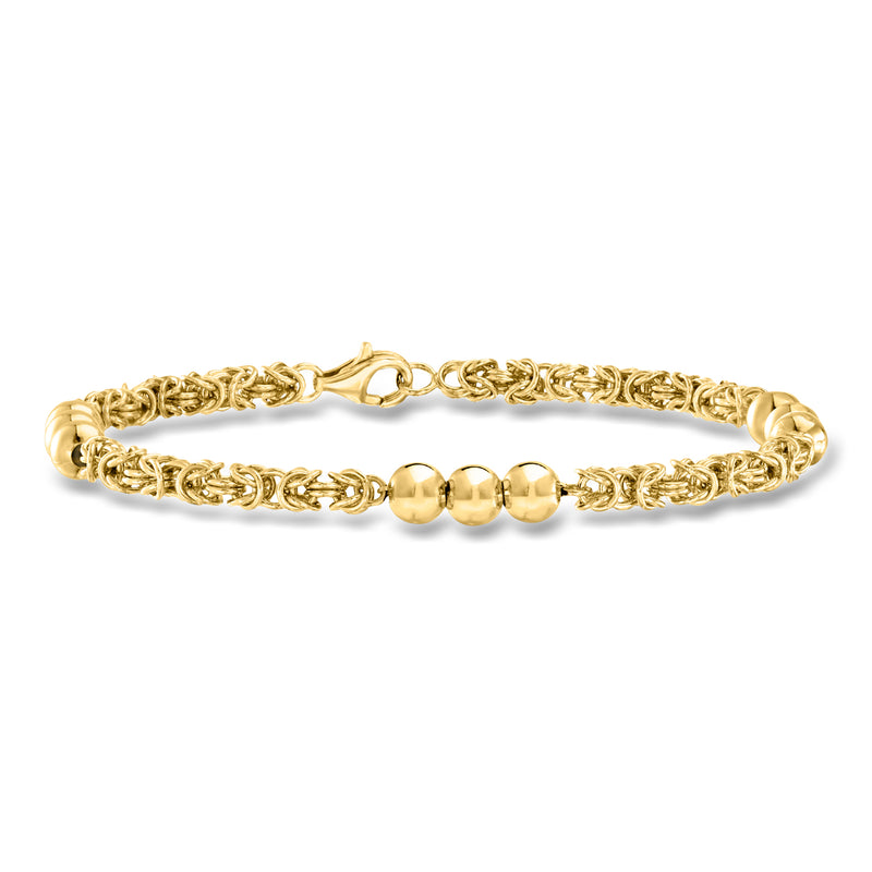 Gold-tone chain bracelet with Byzantine link pattern and three bead station accents