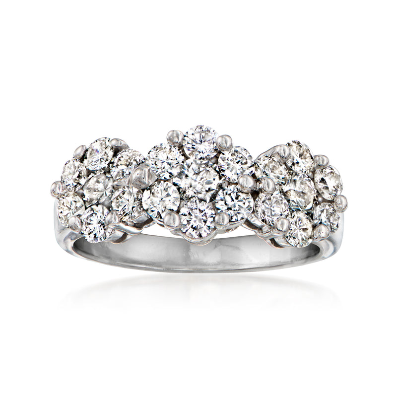 14kt white gold diamond cluster ring with round stones in a sweeping three-row design