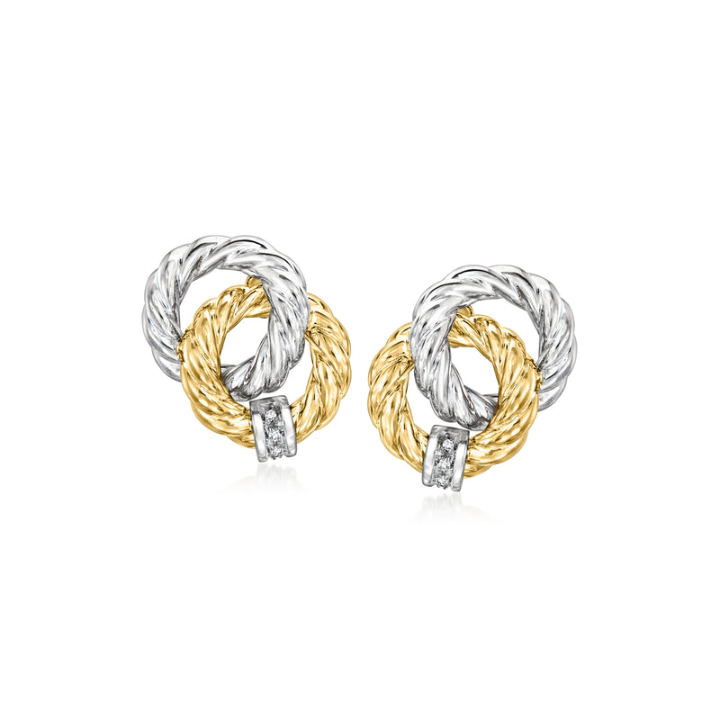 Two-tone gold clip earrings with interlocking circle design and small diamond accents.