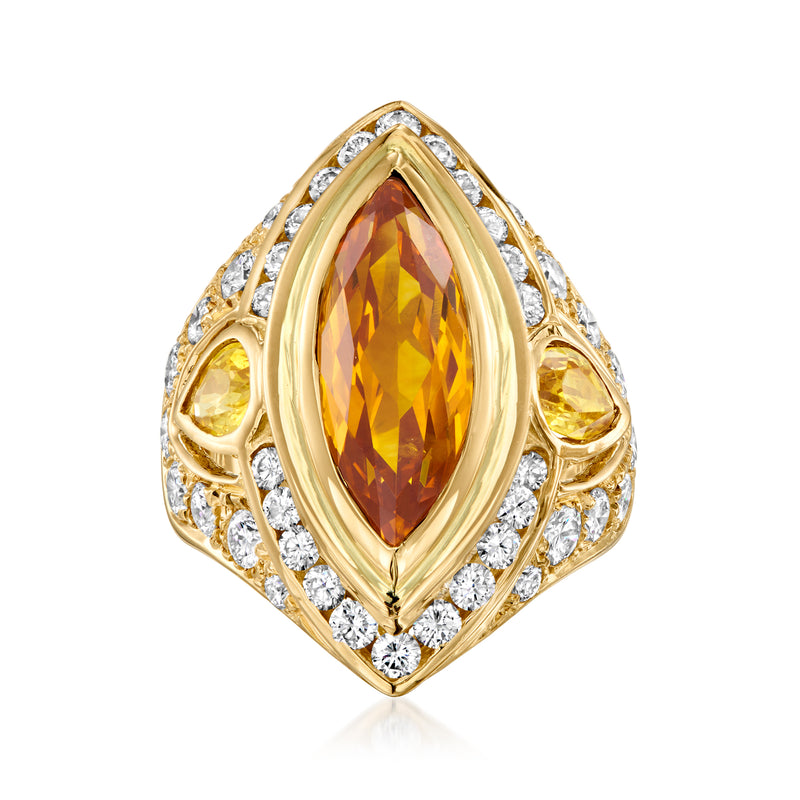 Vintage yellow gold cocktail ring with yellow sapphire center and diamond halo
