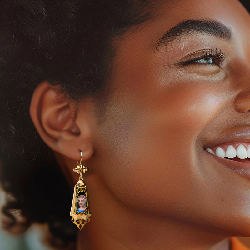Enamel portrait drop earrings in 14kt yellow gold on model, gold earwire with dangling frame