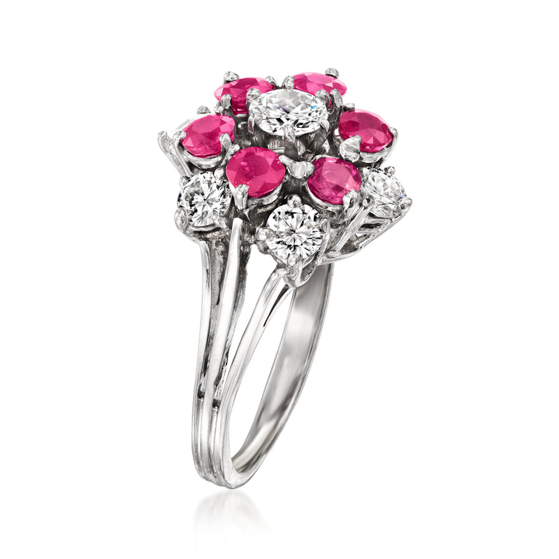 Vintage flower ring in 14kt white gold with ruby-red and clear diamond stones