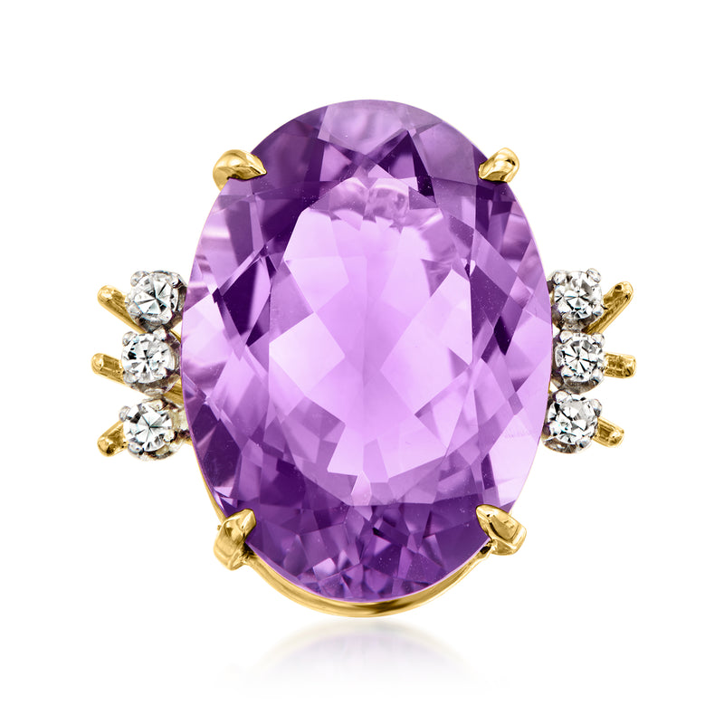 Oval amethyst and diamond ring in 18kt yellow gold, purple gemstone center with side rounds