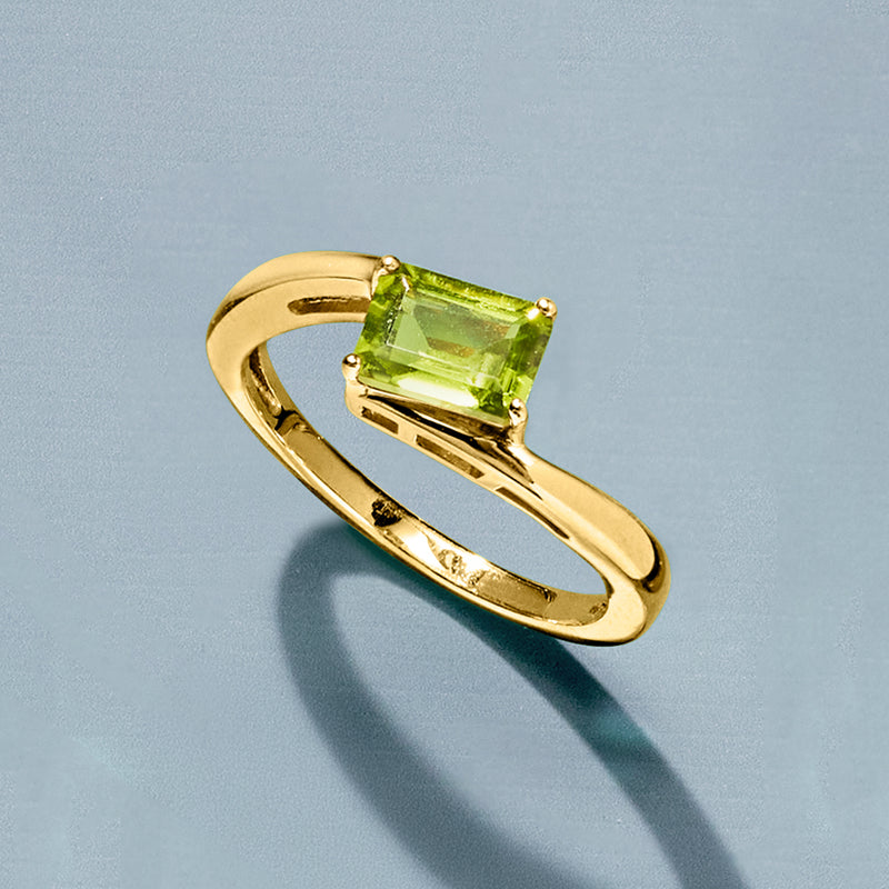 Gold over sterling ring with square peridot gemstone, angled profile view