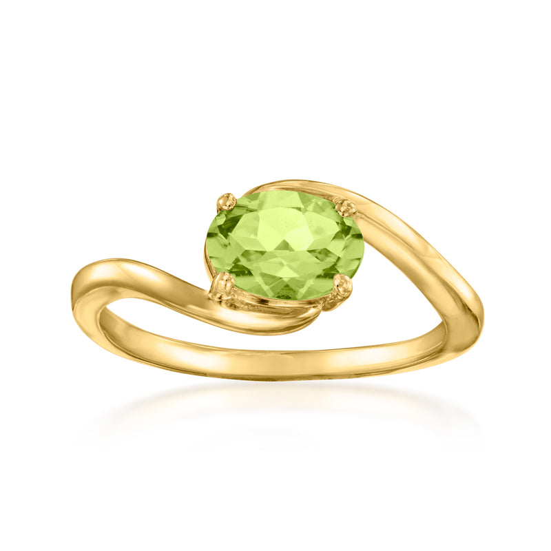 14kt yellow gold peridot ring with oval green gemstone, curved band